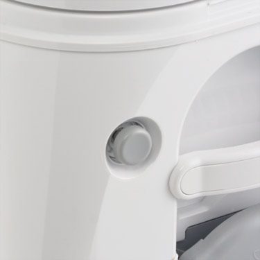 push button operation of the dometic portable toilet